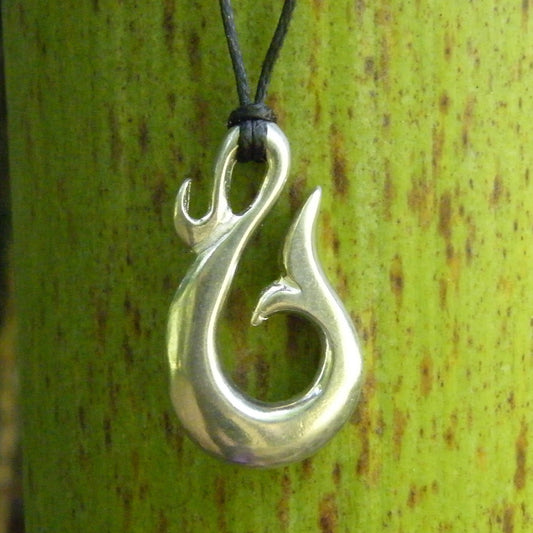 Whales tail hook pendant, symbolising sensitivity and strength. Adjustable Waxed Cord. Handmade in Fine Pewter by William Sturt
